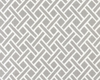 May include: Gray and white woven geometric fabric with a repeating pattern. The fabric has a subtle texture.