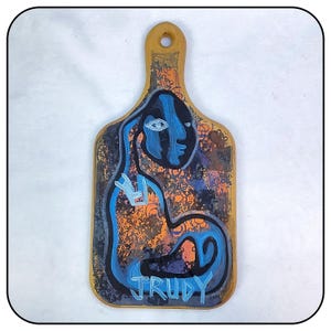 Abstract Outsider Art Figure on a Painted Wooden Cutting Board with Handle by JRUDY