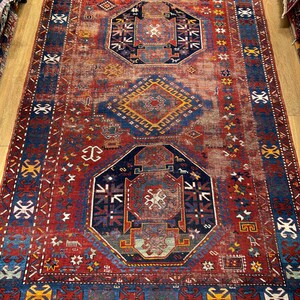 Vintage Turkish Rug: Handwoven Wool Tribal Carpet (8.2 x 5.8 ft)