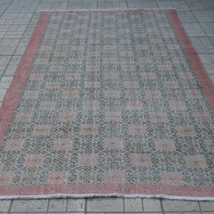 Vintage Handwoven Turkish Rug: Pastel Floral Carpet (9.6 x 5.5 ft)