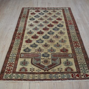 Vintage Turkish Rug: Handwoven Wool Tribal Carpet (5.7 x 3.4 ft)
