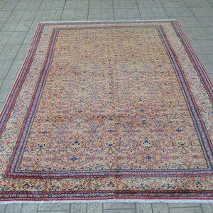 Handwoven Turkish Vintage Rug: Orange Wool Carpet (9.6 x 6.5 ft)