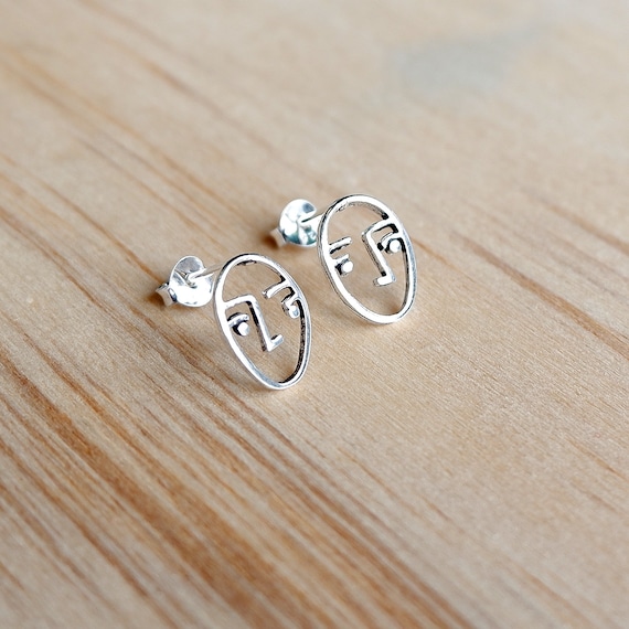 Face earrings discount