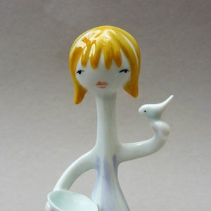 Hollohaza Antonia Osz Szabo porcelain girl with bird figurine