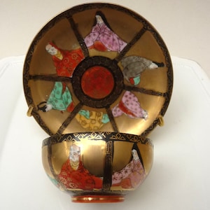 Kutani Taisho porcelain cup with saucer