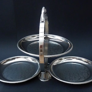 Alessi Mid Century rvs opvouwbare taartstandaard
