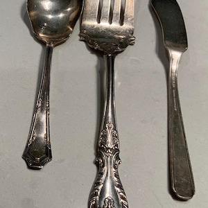 3 Assorted Antique spoon butter knife and serving fork in Silverplate and nice clean as found condition 1920