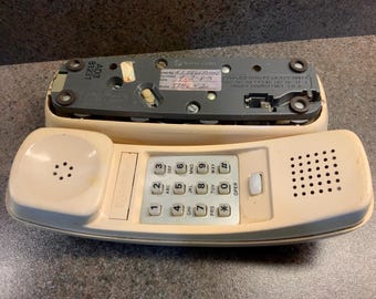 Vintage trim line telephone phone handset in Beige push button