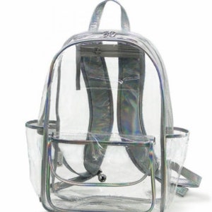May include: A clear iridescent backpack with a zippered front pocket and a large main compartment. The backpack is made of a durable, waterproof material and is perfect for carrying books, laptops, and other essentials.
