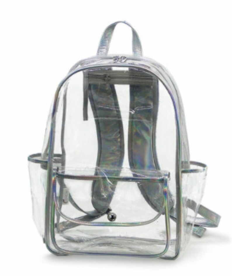 May include: A clear iridescent backpack with a zippered front pocket and a large main compartment. The backpack is made of a durable, waterproof material and is perfect for carrying books, laptops, and other essentials.