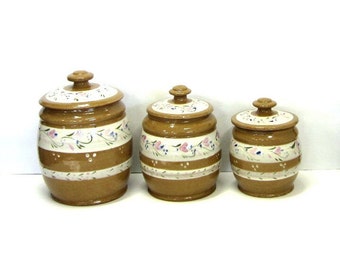 Pottery Canister Set with Winding Floral Design and Signed by Artist