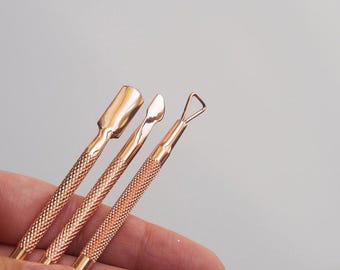 Removedor de cutículas em aço inoxidável dourado rosê (3 peças) / Removedor de pele morta dos dedos (dupla face)