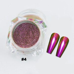 May include: A jar of iridescent purple nail powder with two iridescent nail tips. The jar is clear with a clear lid. The nail powder is a fine glitter. The number "#4" is printed in black on the bottom left.