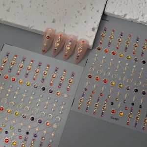 Pegatinas de uñas celestiales en relieve 3D • Calcomanías de uñas con diamantes de imitación de sol, luna y estrella • Pegatinas de manicura cósmicas DIY con línea dorada