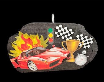 May include: A red race car piñata with a gold trophy, chequered flags, and a stopwatch. The piñata also features a traffic light and flames, all set against a black background.