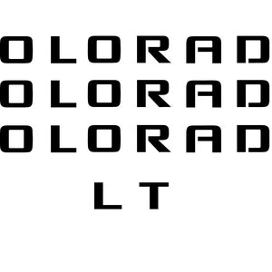 May include: Black and white text on a white background that reads "COLORADO" three times and "LT" once. The image also includes a blue and white logo that reads "GM" with the text "OFFICIAL LICENSED PRODUCT" below.