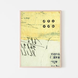 May include: A framed collage of yellowed paper with black ink and handwritten text. The text includes the words "goo" and "onoo".