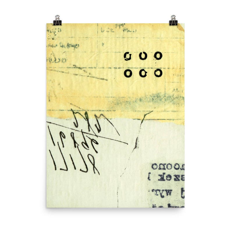 May include: A yellowed, textured paper with black ink markings. The paper has a torn edge and is layered over another piece of paper. The top layer of paper has a series of black circles arranged in two rows of three. The bottom layer of paper has black ink markings that appear to be handwritten.