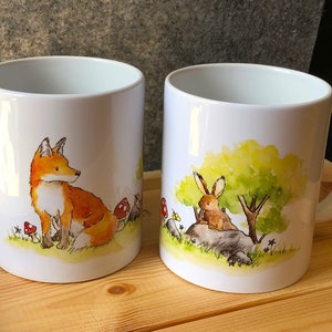 Cup with fox and rabbit