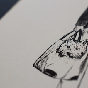 May include: A monochrome illustration of a tote bag with a dog's face design. The bag is held by a person, with the dog's head visible. The artwork is detailed, focusing on the dog's features and expression.