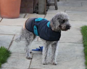 Navy Waterproof coat for dogs. In navy waxed cotton and Harris Tweed detailing