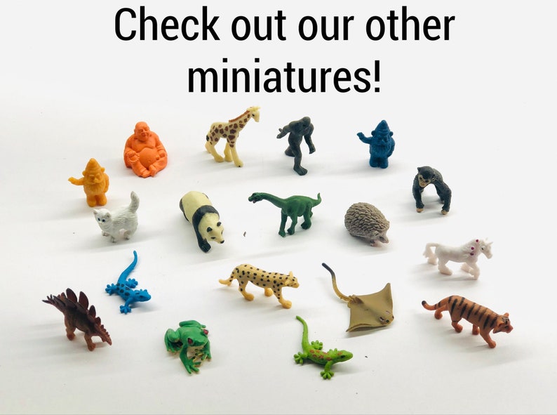 Pode incluir: Uma cole&ccedil;&atilde;o de miniaturas de animais, incluindo uma girafa, um panda, um dinossauro, um ouri&ccedil;o, um unic&oacute;rnio, um tigre, uma arraia e muito mais. Confira nossas outras miniaturas!