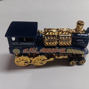 Hot wheels rail rodder train in mint condition diecast car.
