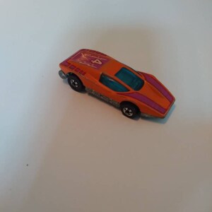 Hot wheels 1974 large charge car  Diecast toys