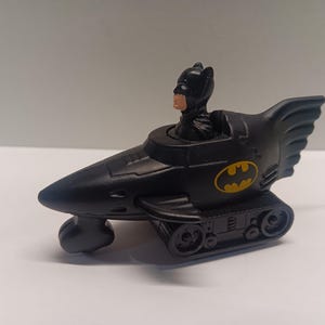 Mcdonalds batmobile bat plane press n go made in 1991 happy meal toy car.