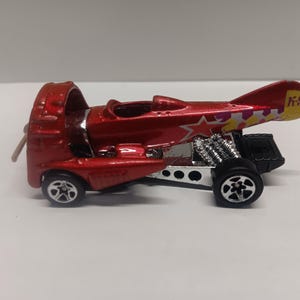 Hot wheels dog fighter airplane car 1998 diecast car.