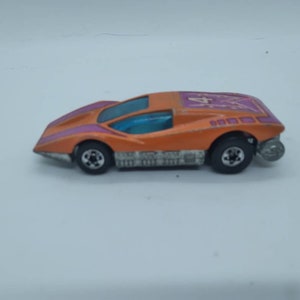 Hot wheels 1974 large charge car  Diecast toys