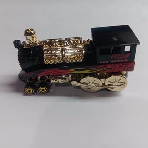 Hot wheels rail rodder train in mint condition diecast car.