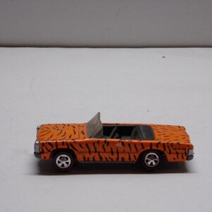 Johnny lightning pontiac gto convertible diecast car.