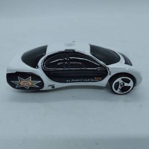 Hot wheels warner cow police car protect and serve from 1993 diecast car