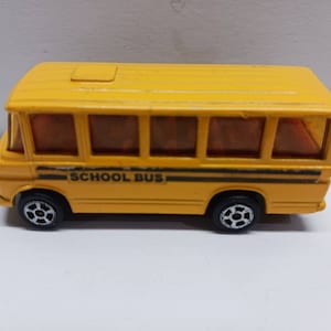 Corgi toys  school bus diecast car.