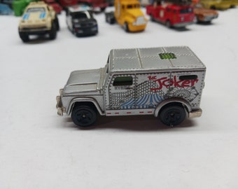 Hot wheels the joker armored truck diecast car.