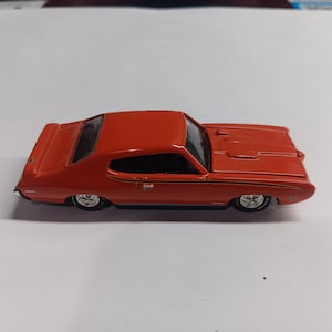 Racing champions  1969 pontiac gto the judge  Diecast car