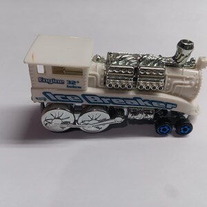 Hot wheels rail rodder train in mint condition diecast car.