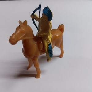 Horse and indian figures made of plastic collectible.