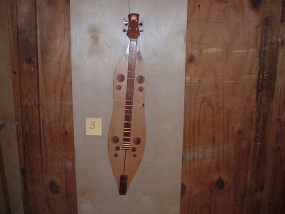 Dulcimer shop top