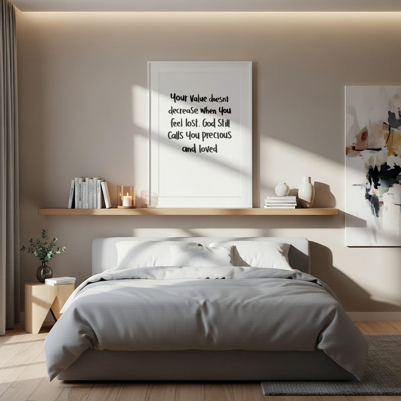 May include: A white ceramic mug with a black handle and the text "But First, Coffee" in a bold, black font. The mug is set against a blurred background, suggesting a cozy setting.