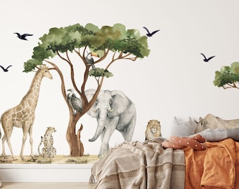May include: A watercolor-style wall decal set featuring a jungle scene with a giraffe, elephant, lion, cheetah, toucan, and vultures. The decals are set against a white background and are perfect for a child's bedroom or playroom.