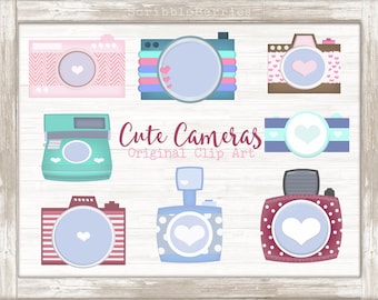 May include: A collection of eight digital illustrations of cameras in various colors and patterns, including pink, blue, brown, and teal. Each camera features a heart-shaped lens or accent. The text "Cute Cameras Original Clip Art" is centered.