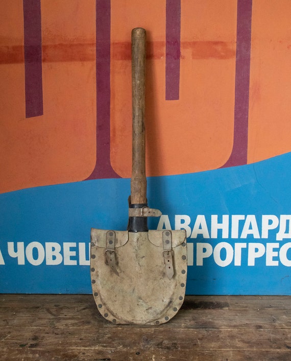 Vintage Army Shovel With a Leather Case