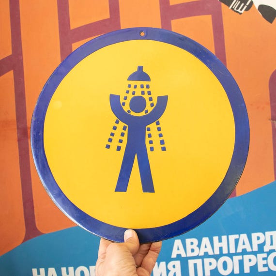Blue and Yellow Factory Sign