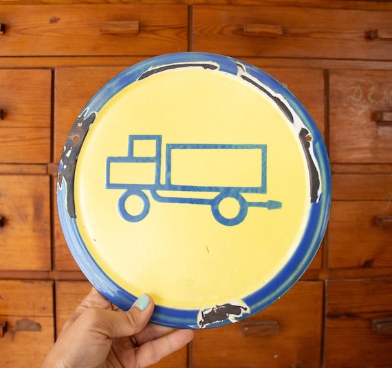 Blue and Yellow Factory Sign Truck