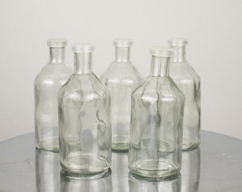 Set van 5 helderglazen medicijnflessen