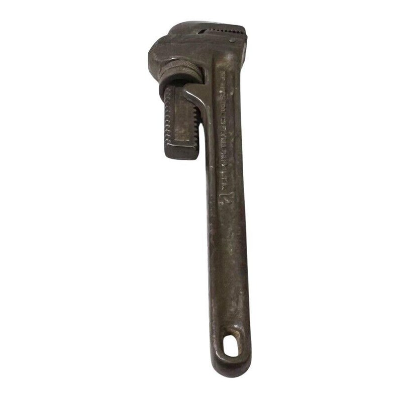 May include: A vintage adjustable wrench with a black finish and the text "The Ridge Tool Co. " imprinted on the handle.