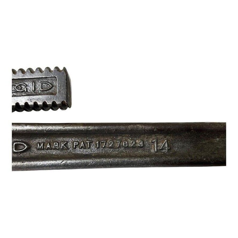 May include: Close-up of a black metal pipe wrench with the text "MARK PAT 1727623 14" stamped on the side.