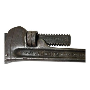 May include: A vintage RIDGID pipe wrench with a black finish and a serrated jaw. The wrench has a trade mark and the text "MARK PAT 172".
